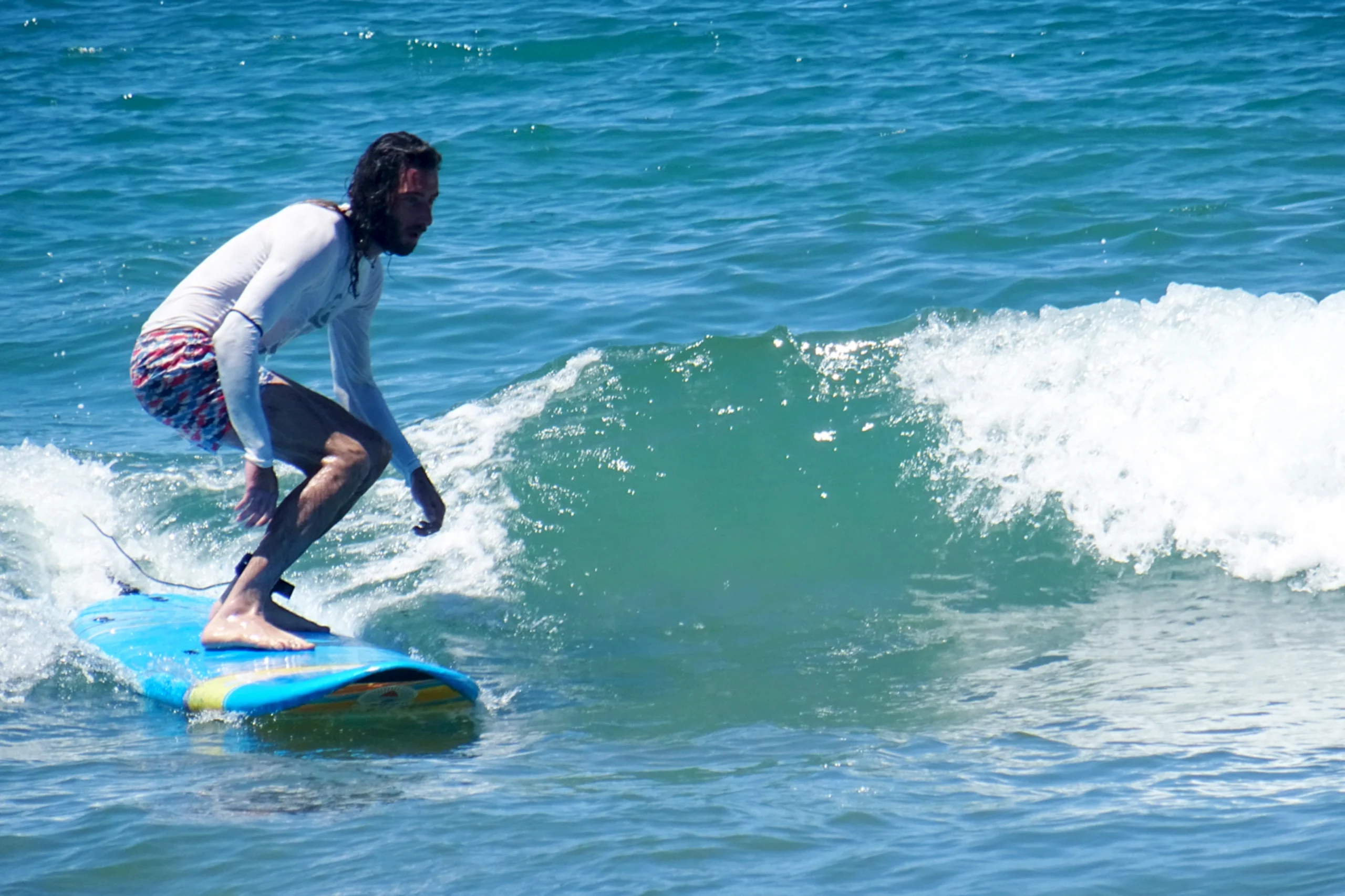 Corso di surf da onda nel Golfo di Baratti con istruttore